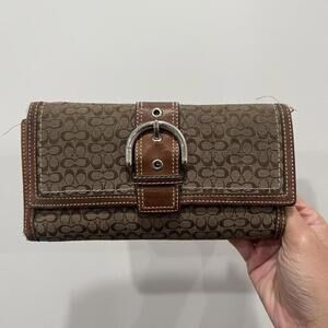 Coach soho y2k brown wallet with signature pattern and belt clasp